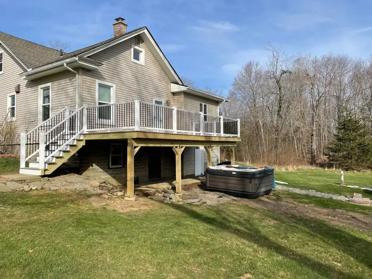 Custom deck with railing built by Westfield Builders in Western Massachusetts